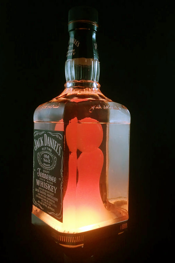 Make these awesome crafts with leftover whiskey bottles