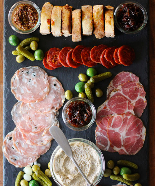 We're Obsessed With These 15 Swoon-Worthy Cheese & Charcuterie Boards Spreads Charcuterie Ham Pepperoni Salami Cornichons 