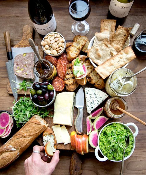 We're Obsessed With These 15 Swoon-Worthy Cheese & Charcuterie Boards Guacamole Baguette Crackers Olives Sprouts Cheese