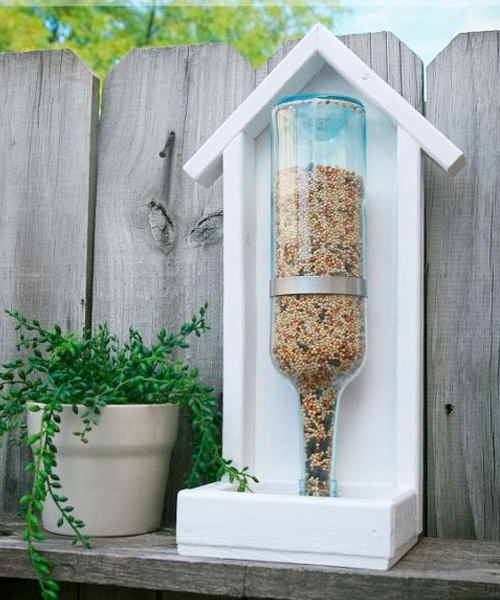 9 Adorable Garden Crafts to Make With Wine Bottles DIY Wine bottle bird feeder