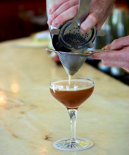 Making a blood and sand cocktail at sauvage