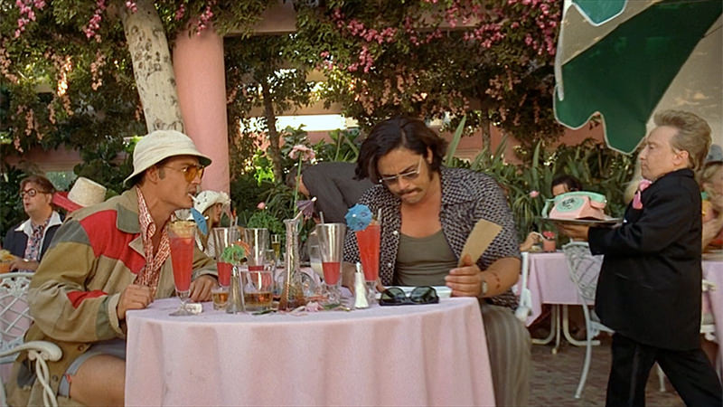 The signature drink in Fear and Loathing in Las Vegas is a Singapore Sling with a shot of mezcal.