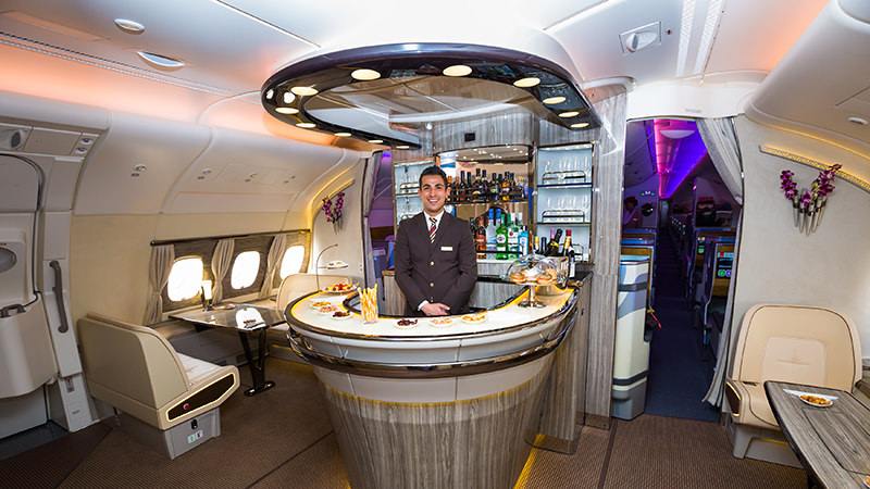 Emirates' A380 has a bar pouring Veuve Clicquot inflight.