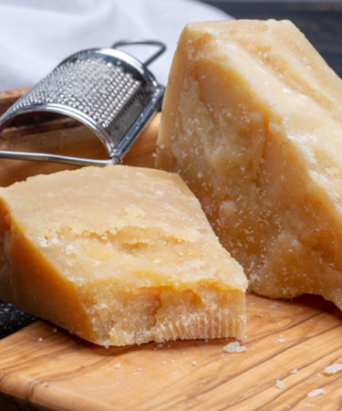 The Differences Between Parmesan, Parmigiano-Reggiano, and Grana Padano, Explained