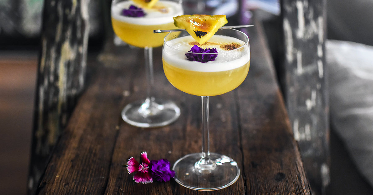 For a tropical twist on a traditional sour, cocktail connoisseur Natalie Migliarini adds freshly muddled pineapple, citrus, and gin.